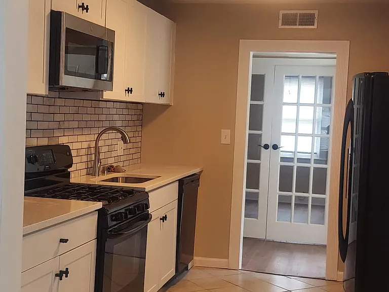6602 Woodland Rd — Photo 3
