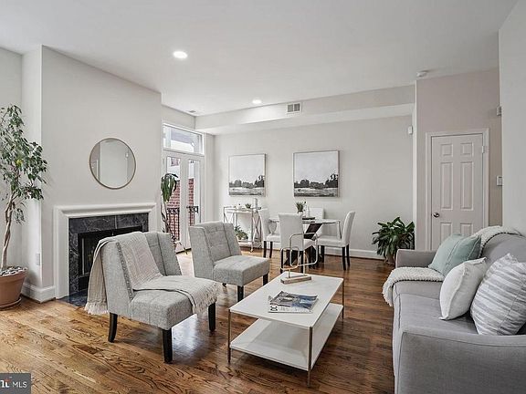 Living room with working wood fireplace.