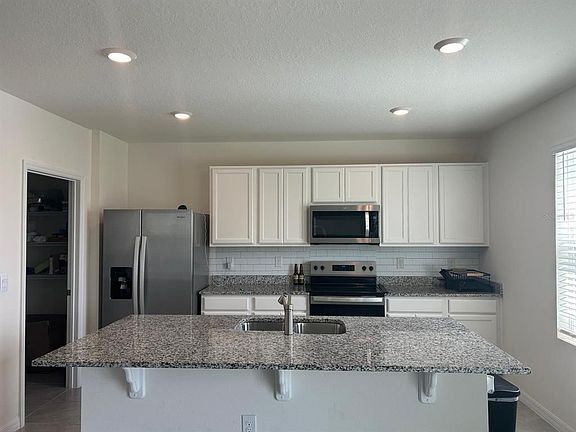 3rd image of 3841 ROYAL AZALEA WAY
