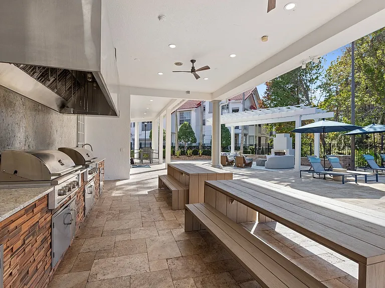 Entertain in the Outdoor Kitchen and Grilling Area