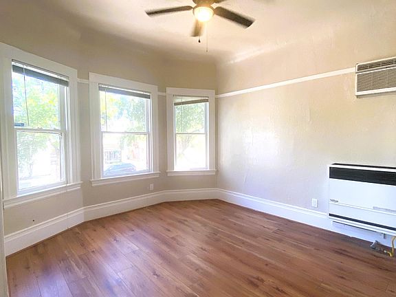 Living room with bay windows