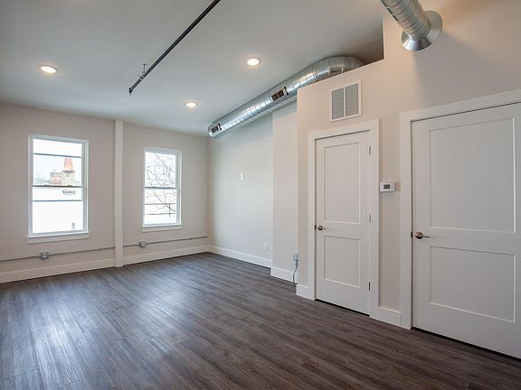 Coat closet in entry.