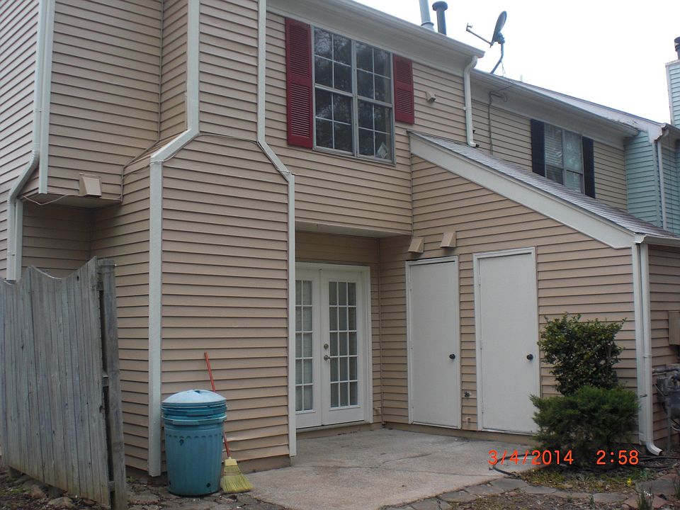 Back has nice patio and small yard.