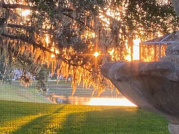 Water view with sunset