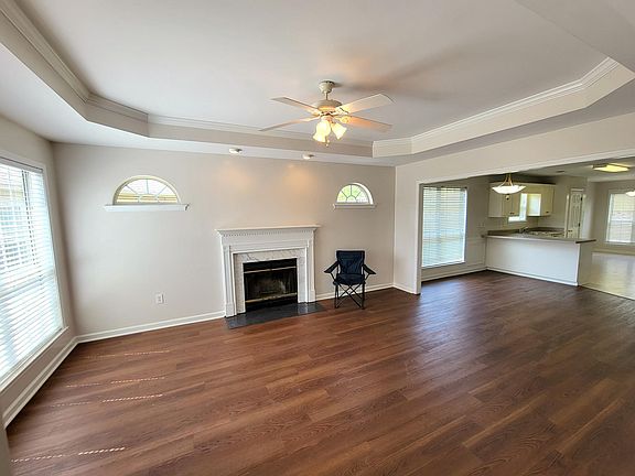 Family room/Den with large front window & fireplace