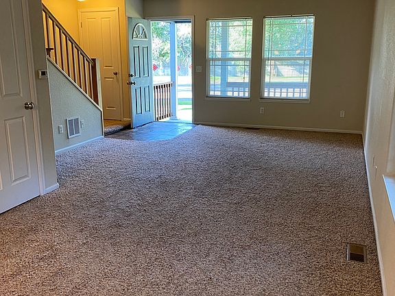 View of living room to the front door