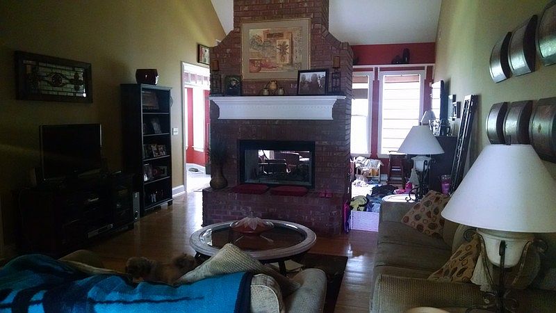 Great room
						:
						14' ceilings with double brick fireplace