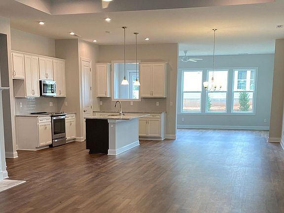 Great Room looking onto Kitchen and Dining