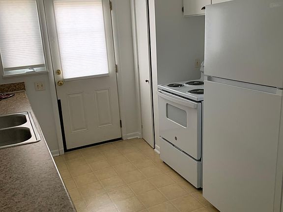 Kitchen with rear entrance