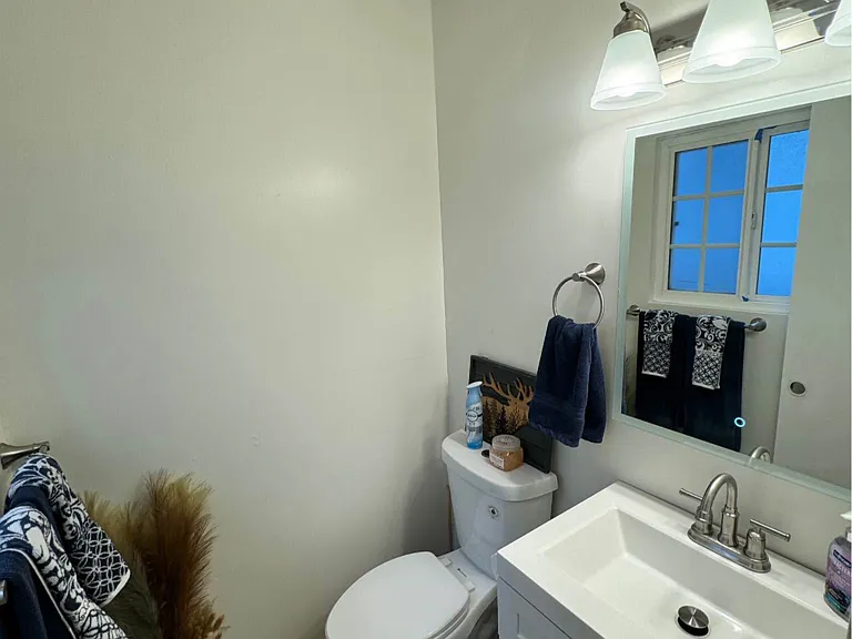 New half bath in master bedroom.