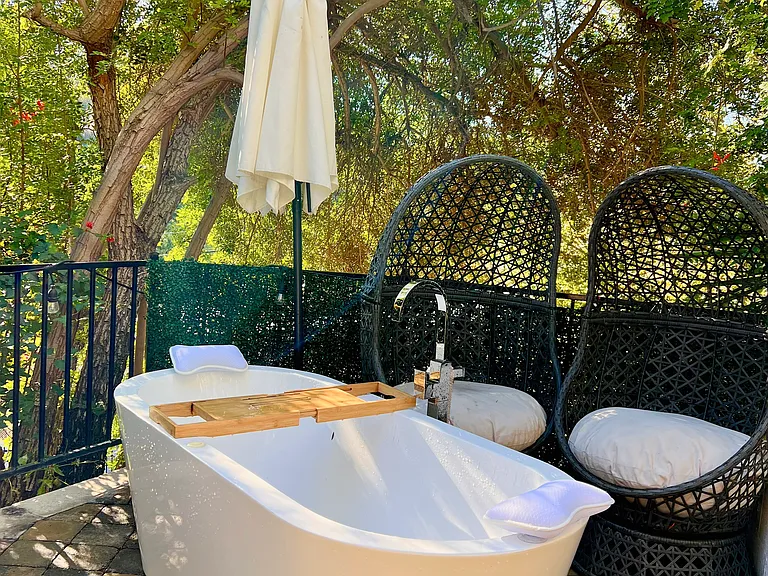 Outdoor bathtub is exclusively for guesthouse tenant