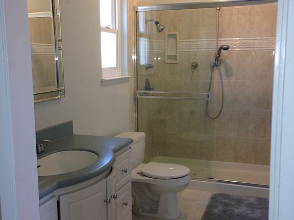Two head showers, fan and two light setting