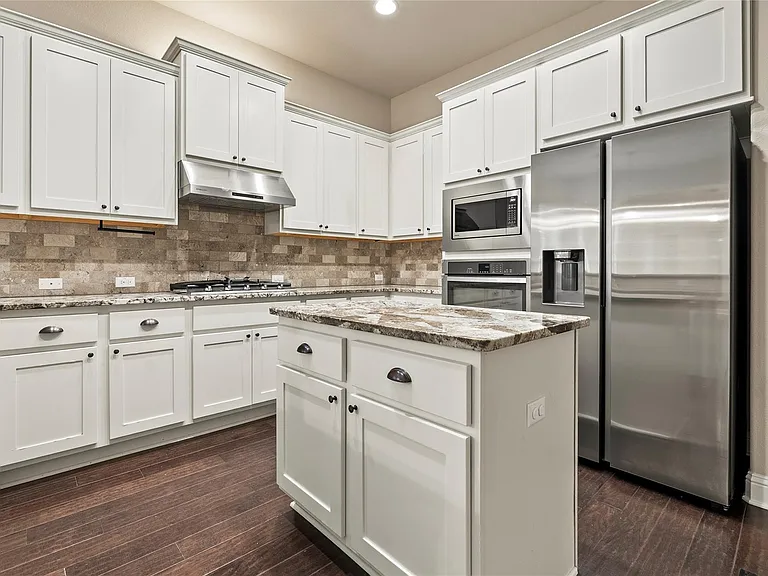 11704 Quintana Cv — Photo 18