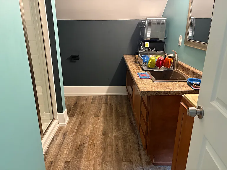 bathroom with small cooking area