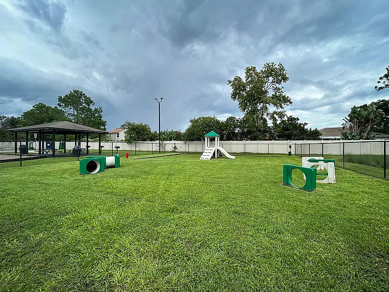 Explore the enjoyment your pet will have in this spacious, well-equipped dog park!