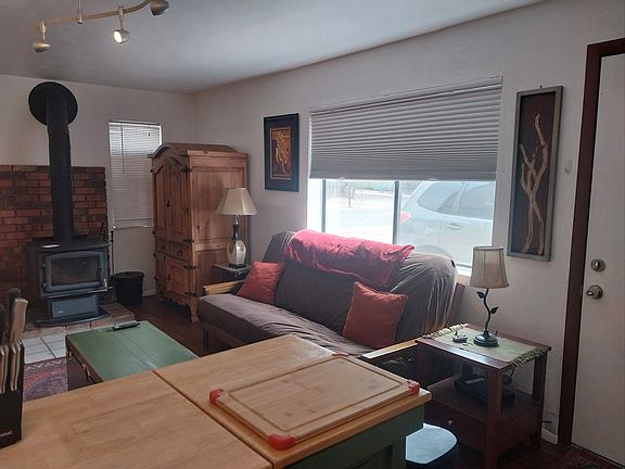 Comfortable full-size futon couch, lots of windows, southwest-inspired decor