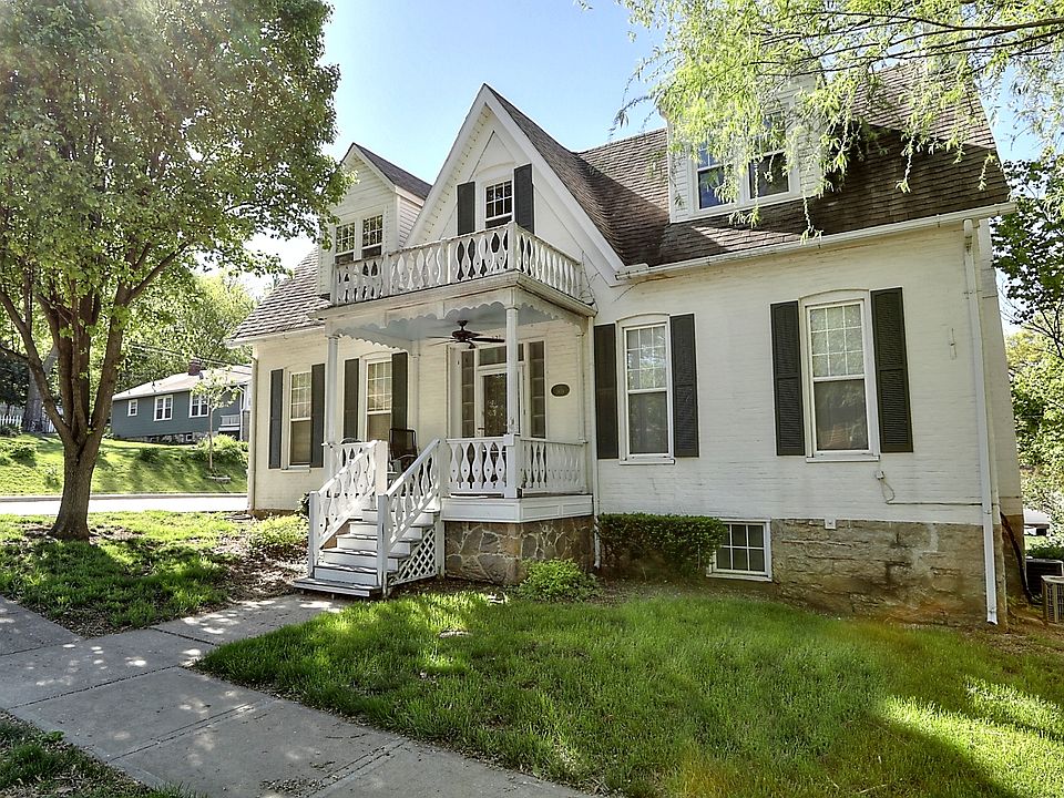 Brick Victorian built in 1859. Divided in individual apartments. Walking distance to Main St shops