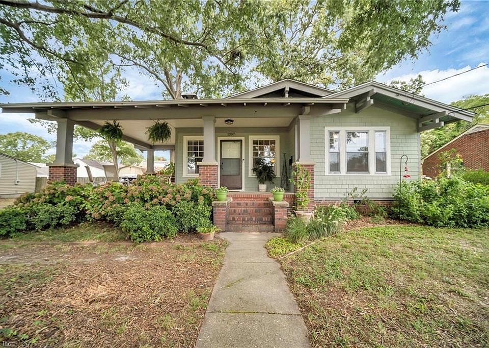 Lovely Craftsman Bungalow with original details maintained.