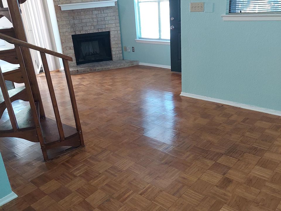 1st floor living space. Entry door between 2 windows.