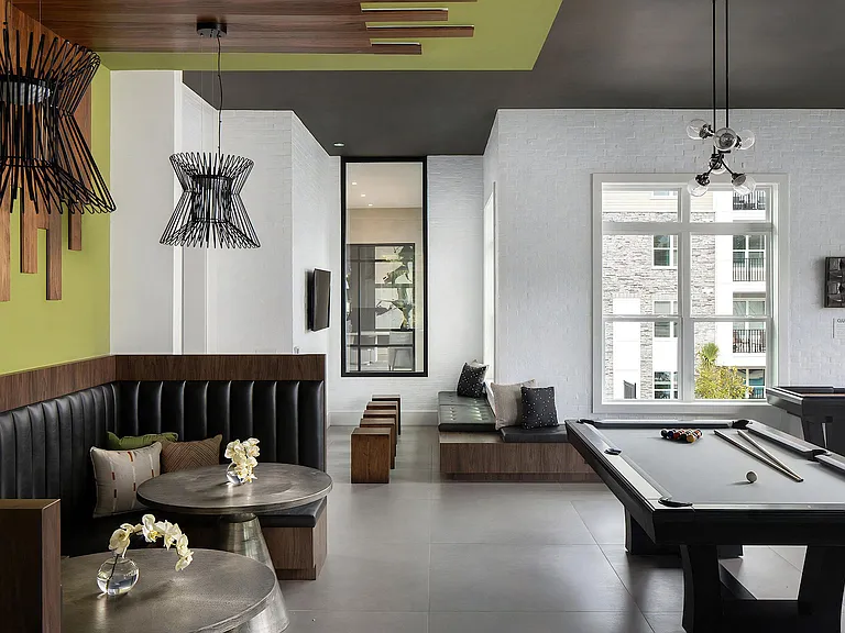 Game Room with Lounge Booths, Pool Table, and Bold Modern Design