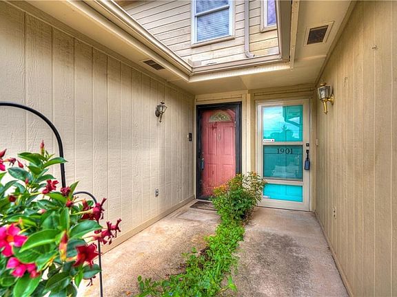 Flowers are everywhere!  The front door was repainted red!