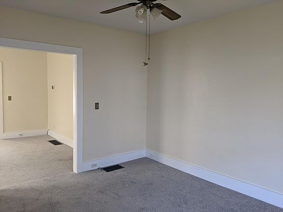 Living room onlooking dining room