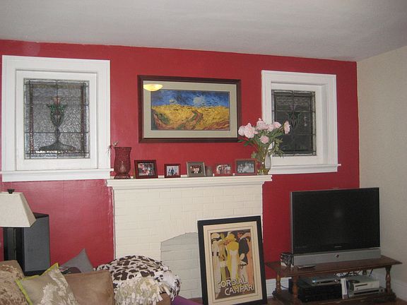 2nd Floor Living Room Cream w/ Red Accent wall. 