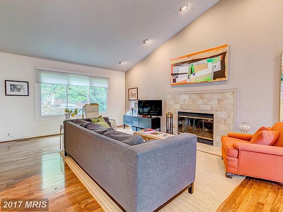 family room w hardwoods and new windows