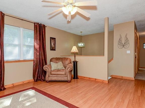 ENTRY STAIRWAY / LIVING ROOM / HALL TO BEDROOMS AND BATH