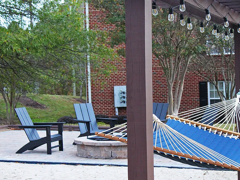 Outdoor Lounge with Fire Pit, BBQ Grills, and Hammock