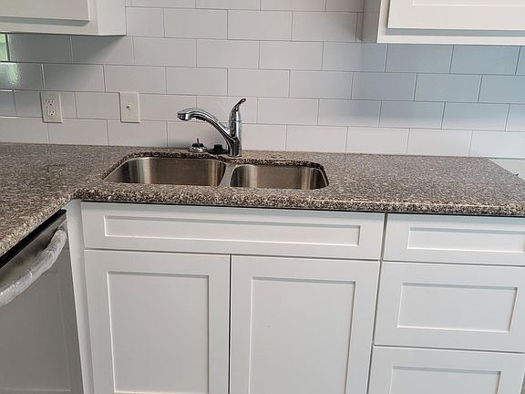 Granite countertops, new dishwasher, new drawers.