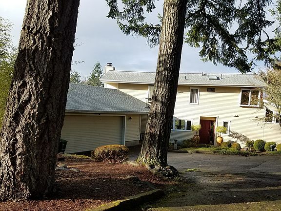 Front Entrance: large/long driveway, oversized 2-car garage