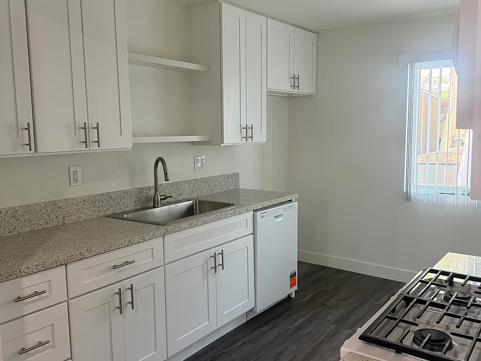 Spondee Apartments