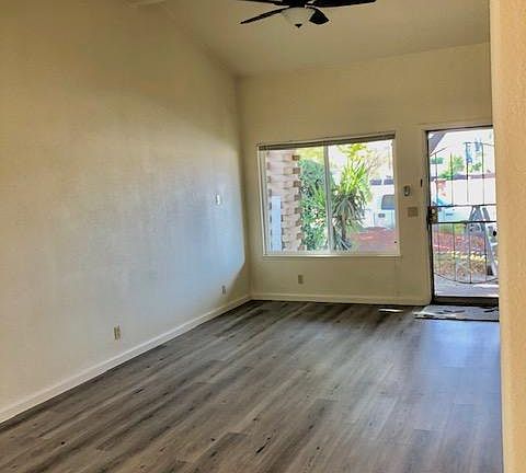 Beautiful new waterproof flooring throughout unit. Vaulted ceiling in living room, ceiling fan, and security screen door!