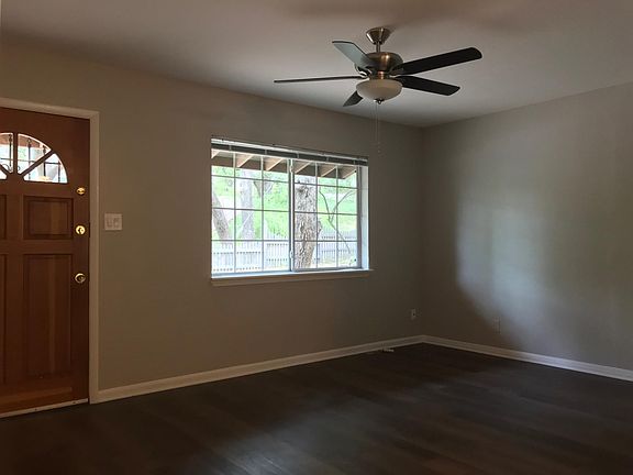 Spacious living room with lots of natural light.