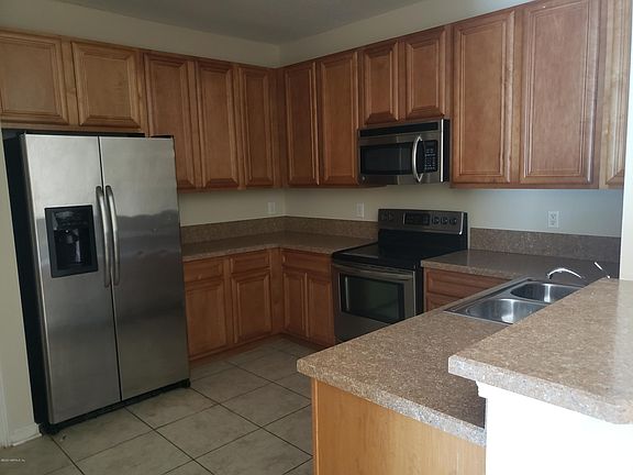 4th image of 6935 Ortega Woods Dr #5-1