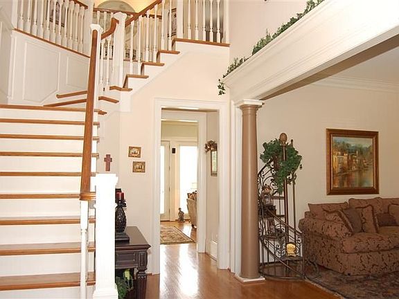 From the grand portico entrance, through the 8 ft solid wood door to the foyer