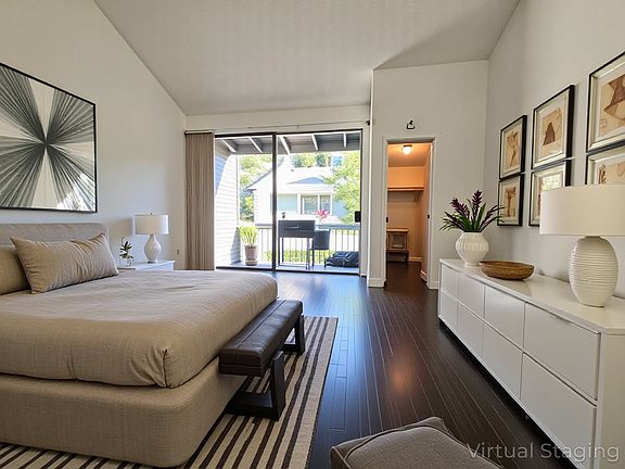 Virtually Staged Master bedroom 2nd floor with private patio