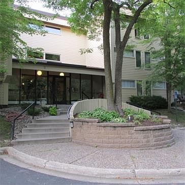 Private wooded location for this exclusive 55+ building. Strong association and meticulous building with tons of amenities!
