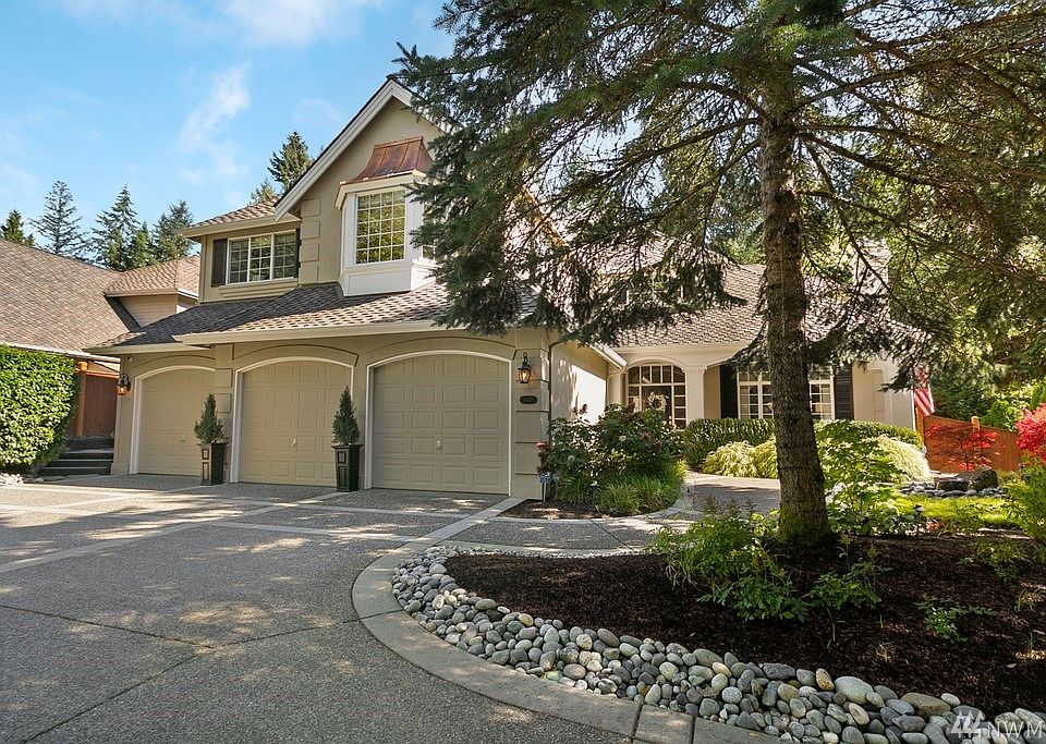 Corner lot in coveted Hyde Park with circular drive.