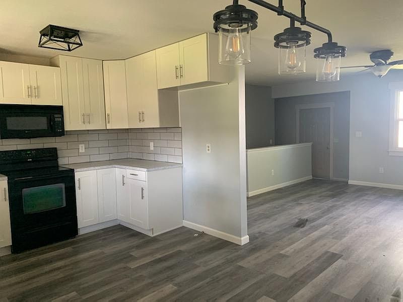 Kitchen looking into living room.
