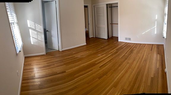 Master bedroom with lots of natural light and roomy closet.