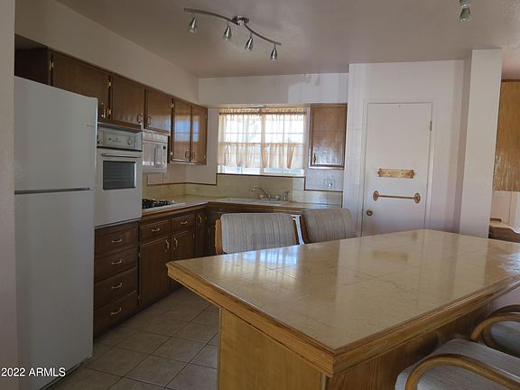 5th image of 10719 W Tropicana Cir