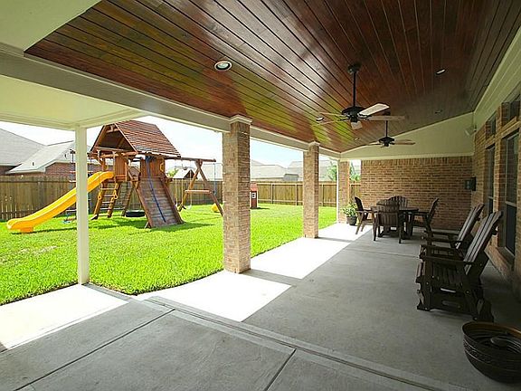 BEAUTIFUL BACK PATIO WITH CEILING FANS