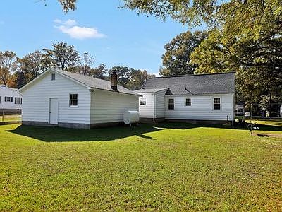 Back of garage and house