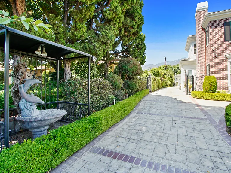 West side of House Drive way to the back