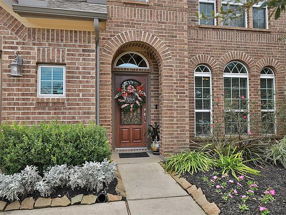 You will be impressed with the landscaping and trees including custom landscaping and house lighting. The garage has an added 5 foot workspace for your projects and bikes!