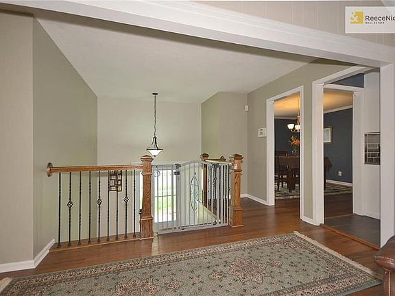 Classy entryway with wood floors