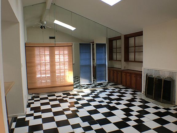 Another view of the living room with skylight
