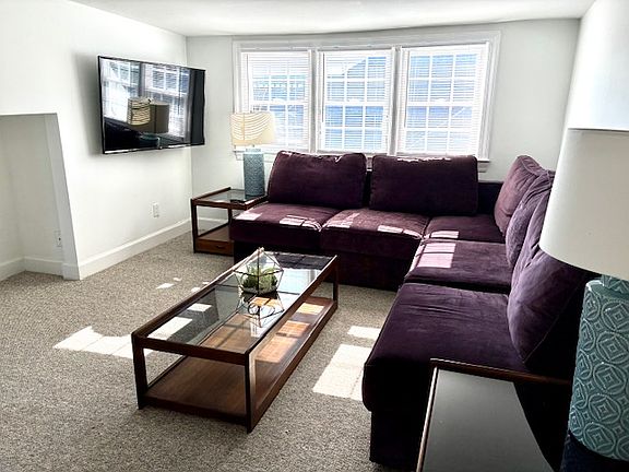 Living room with large mounted smart TV